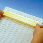 Tab tag label for printed portion protection